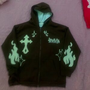 brown zip up with fur designs